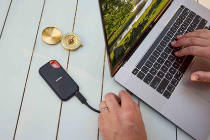SANDISK 2TB Extreme Portable SSD (Old Model) - Up to 1050MB/s, USB-C, USB 3.2 Gen 2, IP65 Water and Dust Resistance, Updated Firmware - External Solid State Drive - SDSSDE61-2T00-G25
